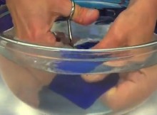 This-Woman-Put-Glass-Into-Water-And-Started-Cutting