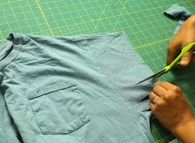 She Cuts Into The Sleeve Of Her Old T-Shirt
