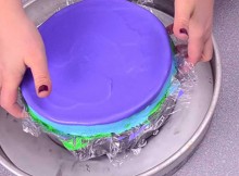 A Rainbow Cake Dropped Into A Hot Water Pan