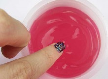 She Dipped Her Finger Into Pink Gel