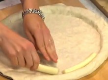 She Laid Some Cheese On The Dough And Folded It Over