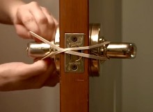 The Rubber Band Is Pulled On A Door Handle