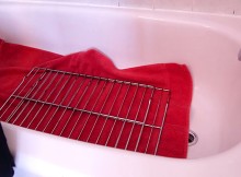 The Unclean Oven Racks Were Put Into The Bathtub