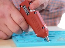 This Guy Fills The Mold Using Hot Glue