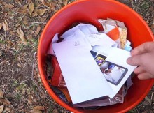 This Guy Soaks The Junk Mails IntoA Container With Water