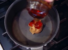This Lady Mixes Honey And Butter In A Pot