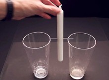 He Set Up 2 Cups And Balanced A Candle
