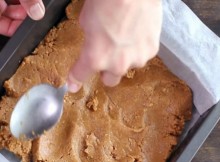 PressingBottomLayerofNoBakePeanutButterBars-
