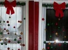 BallOrnamentsHangingInFrontOfWindowsHeader