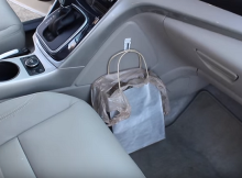 FrontofCarwithTrashBag